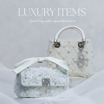 手作業で装飾を施す至高のバッグ。